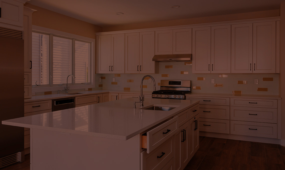 Installing cabinets and counter top in a white kitchen partially installed furniture manchester nj 2