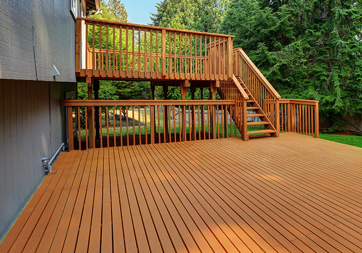 front view of a wood deck on a yard manchester nj