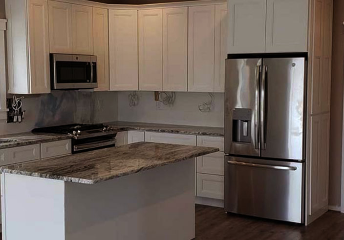 kitchen before remodeling with stone counter and white cabinets manchester nj